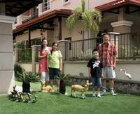 Second Sister's Second Son, Wife, Son & Duaghter in their fropnt garden, Kuala Lumpur