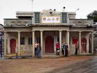 Standing by old people's centre (former Kindergarten) in Mother's home village Hui'an China