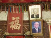 Photographs above alter in living room- Mother's Father (above) and Mother's First Brother (below)